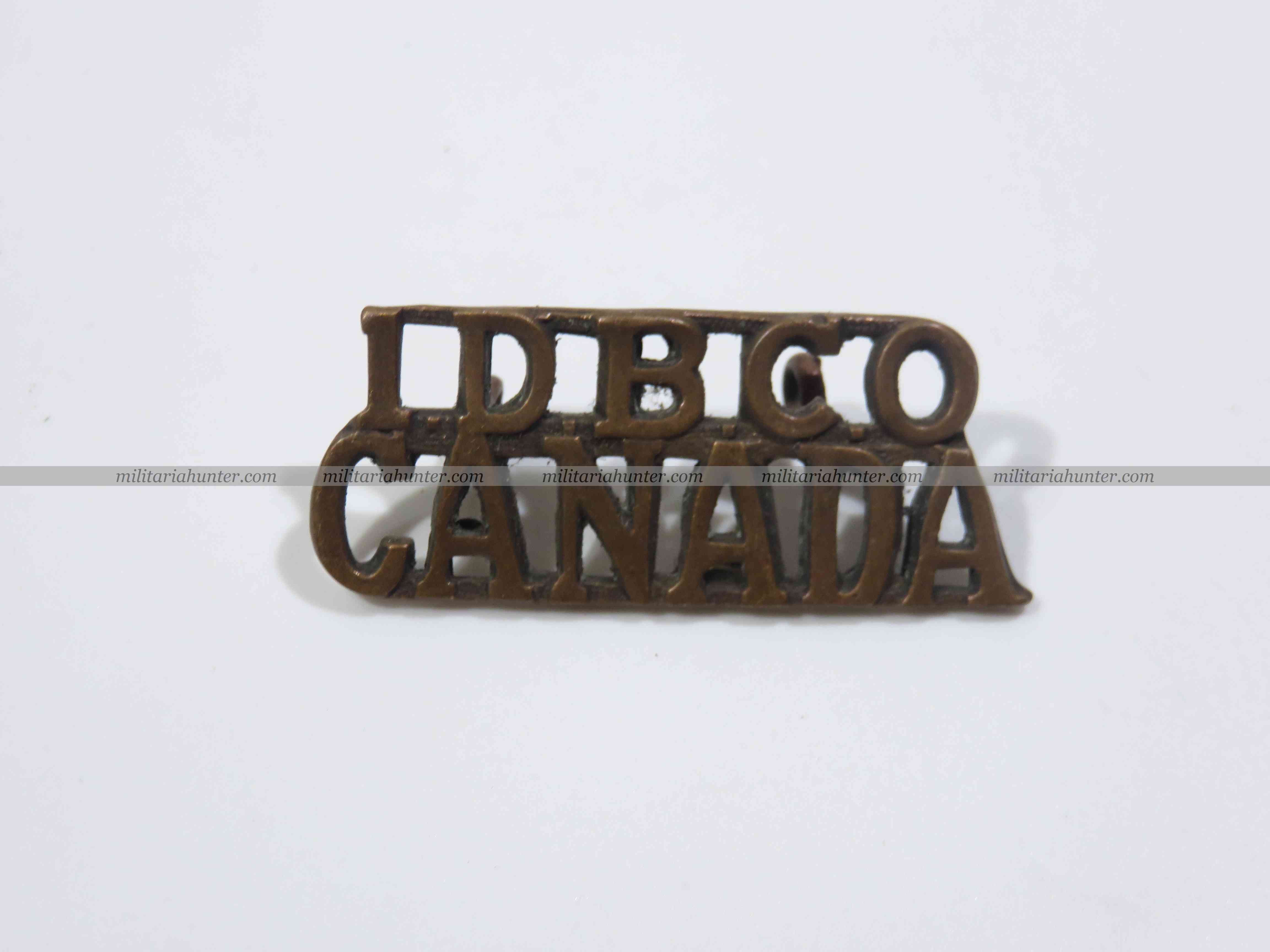militaria : ww1 CEF Canadian 1st D.B.C.O. brass shoulder title